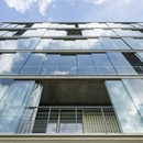 Atelier Kempe Thill的混凝土和玻璃社交住房公寓